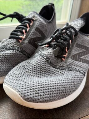 New Balance Gray Knit Sneakers with Pink Accents